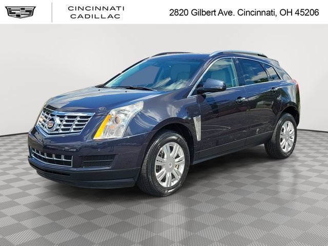 2015 Cadillac SRX Luxury Collection in Sapphire Blue Metallic — front three-quarter view