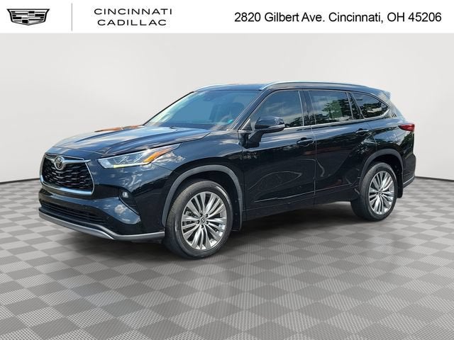 2022 Toyota Highlander Platinum in Midnight Black Metallic — front three-quarter view